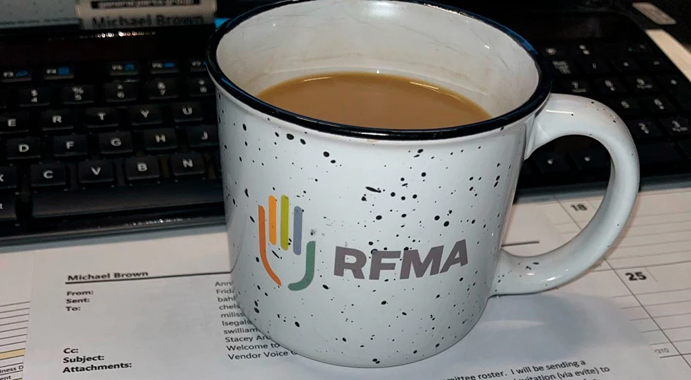 Cup of Coffee with RFMA logo on the front